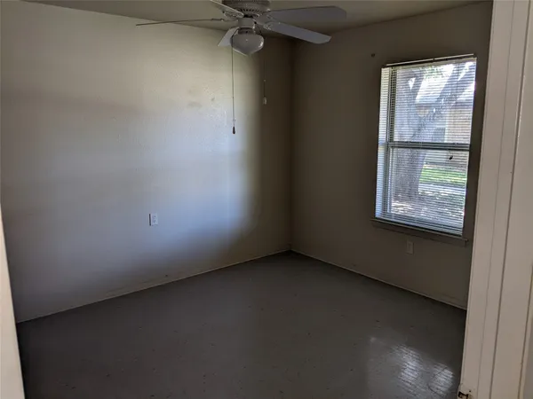 an empty room with a window