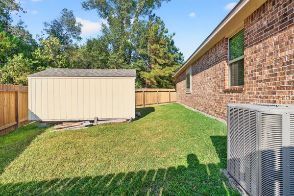 a view of a backyard with a garden