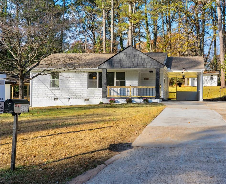 3402 Jackson Drive Decatur, GA 30032 - Photo 1 of 1 a front view of building with yard