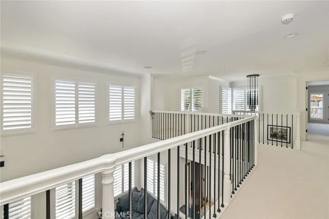 a view of gallery with wooden floor