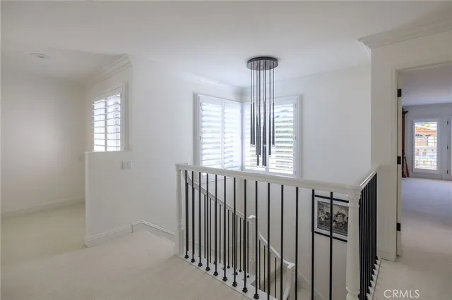 a view of hallway with windows