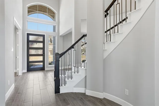 a view of front door with stairs