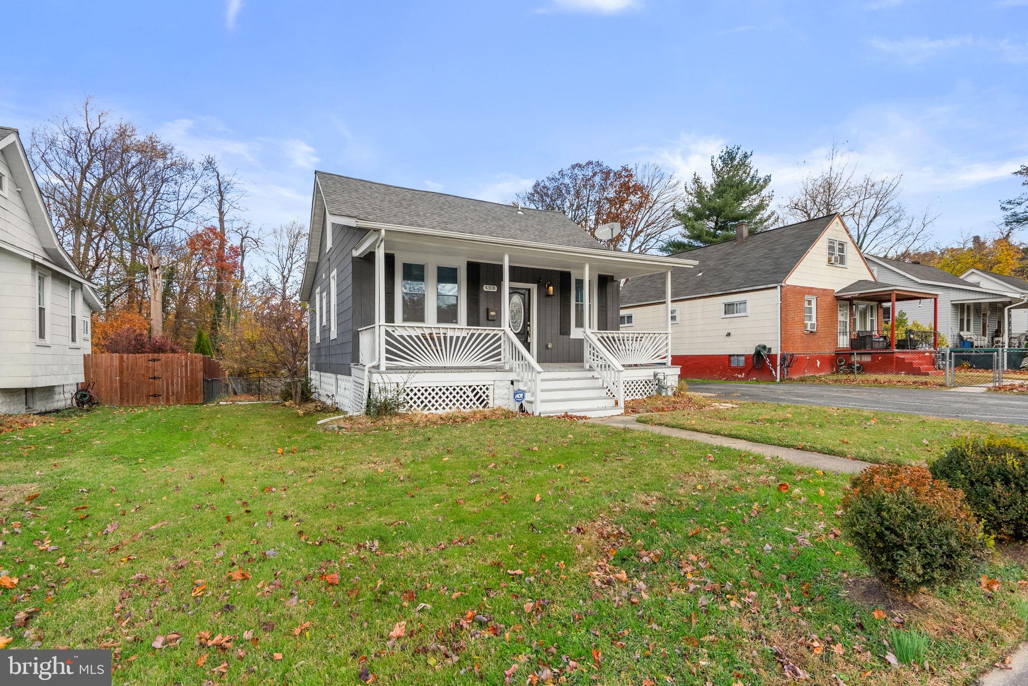 4308 Mainfield Avenue Baltimore, MD 21214 - Photo 2 of 41 a front view of house with yard and green space