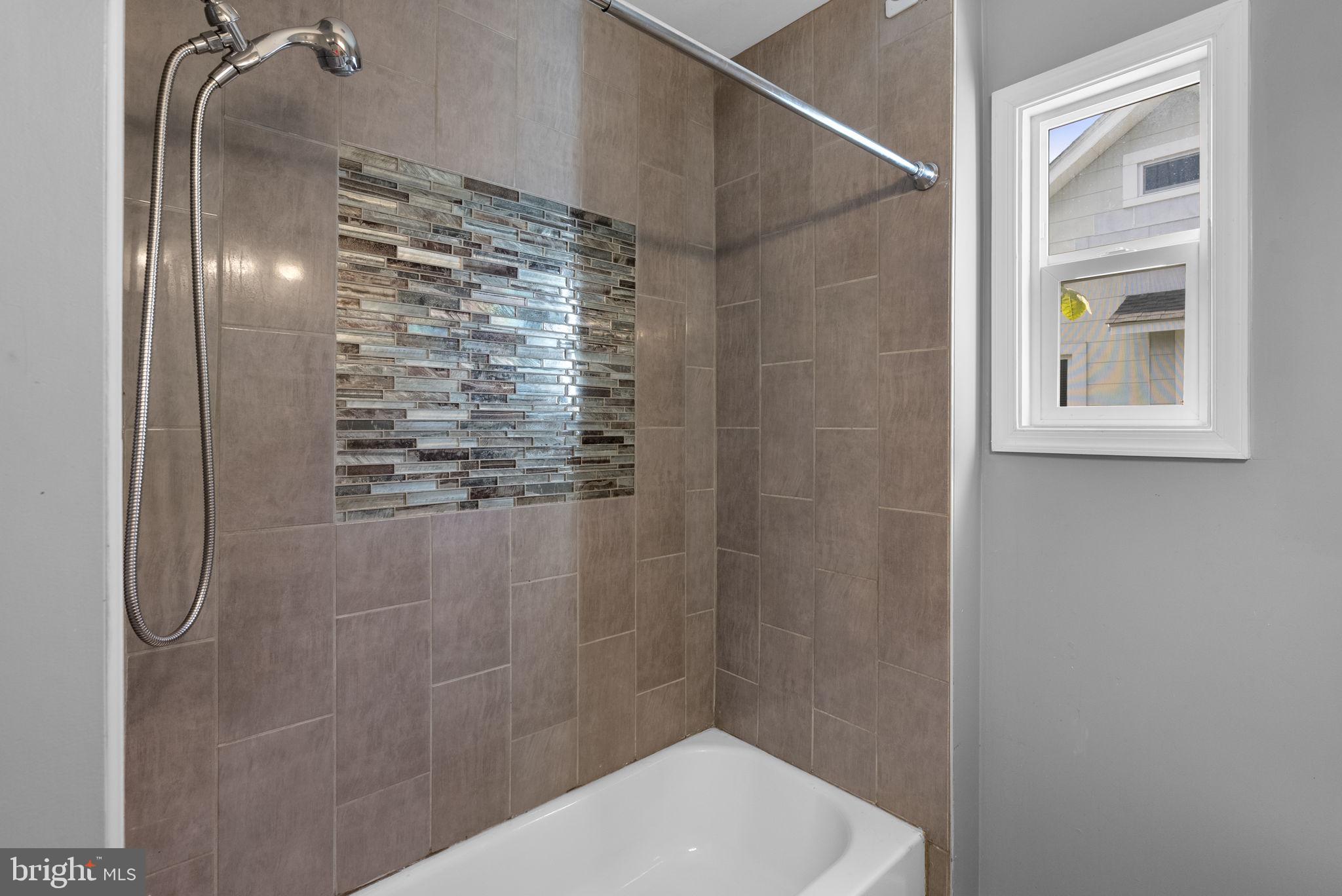 4308 Mainfield Avenue Baltimore, MD 21214 - Photo 25 of 41 a bathroom with a shower