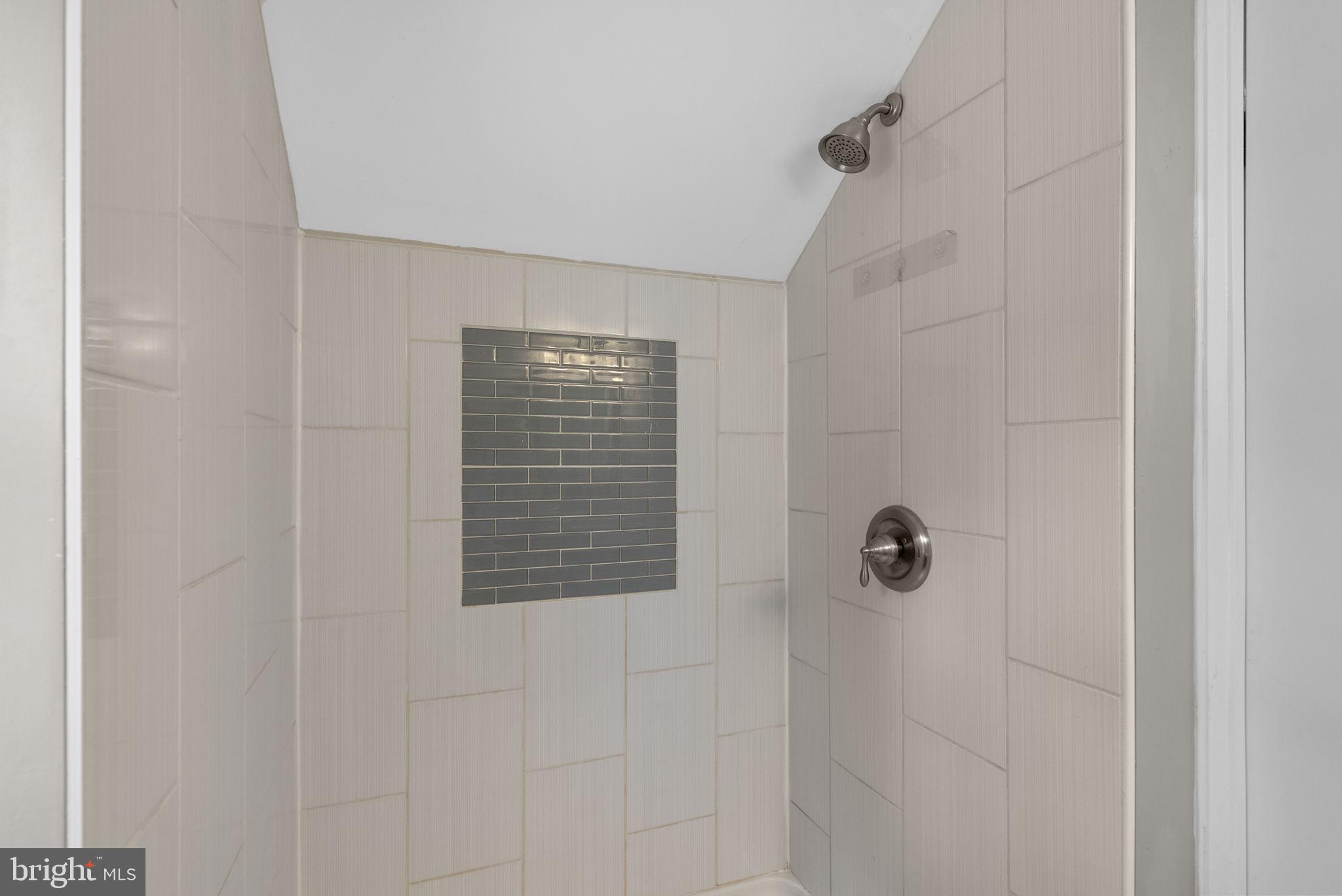 4308 Mainfield Avenue Baltimore, MD 21214 - Photo 32 of 41 a bathroom with a shower