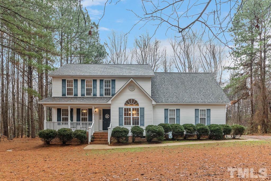 201 Tast Drive Wendell, NC 27591 - Photo 1 of 22 a front view of a house with garden
