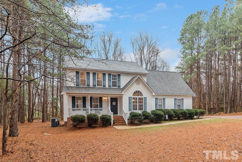 201 Tast Drive Wendell, NC 27591 - Photo 2 of 22 a front view of a house with a yard