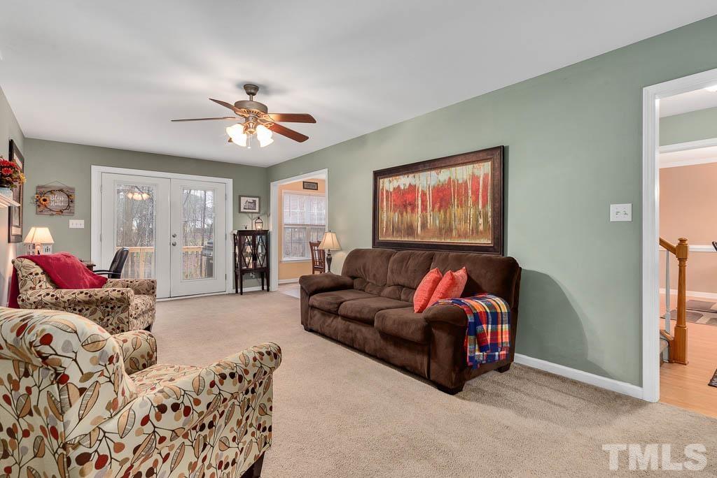 201 Tast Drive Wendell, NC 27591 - Photo 7 of 22 a living room with furniture ceiling fan and a rug