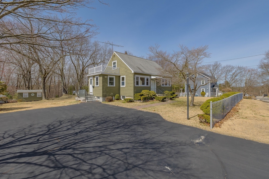 23 Fox Hill Road Billerica, MA 01821 - Photo 35 of 36 a view of the house with a yard