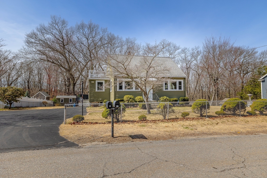 23 Fox Hill Road Billerica, MA 01821 - Photo 36 of 36 a front view of a building with cars parked