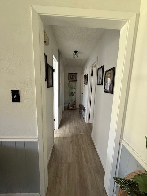 451 Pennington Street Lovelady, TX 75851 - Photo 11 of 28 a view of a hallway with wooden floor and staircase