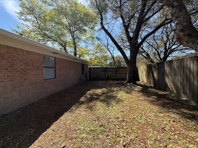 451 Pennington Street Lovelady, TX 75851 - Photo 24 of 28 a backyard of a house with lots of green space