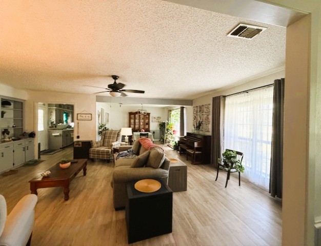 451 Pennington Street Lovelady, TX 75851 - Photo 6 of 28 a living room with furniture and a wooden floor