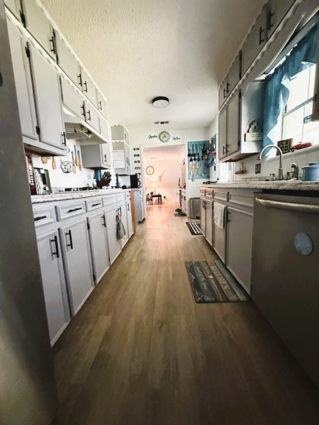 451 Pennington Street Lovelady, TX 75851 - Photo 8 of 28 a open kitchen with stainless steel appliances granite countertop lots of counter top space