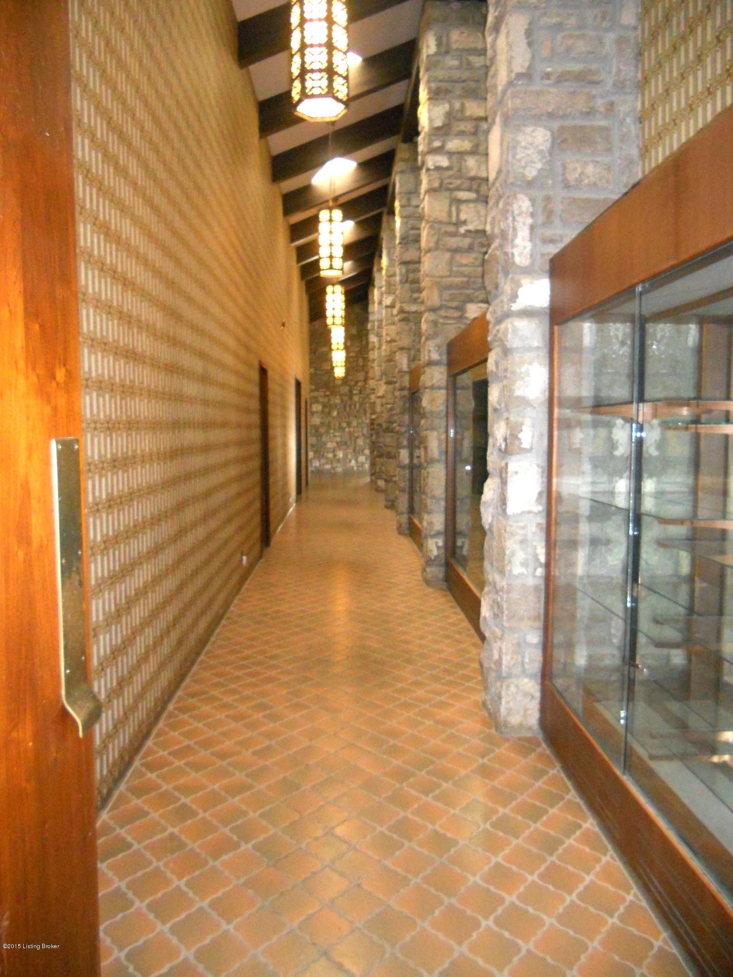 Large hallway leads to Great Room/Banquet Hall, Dining Room and Eat-in Kitchen.