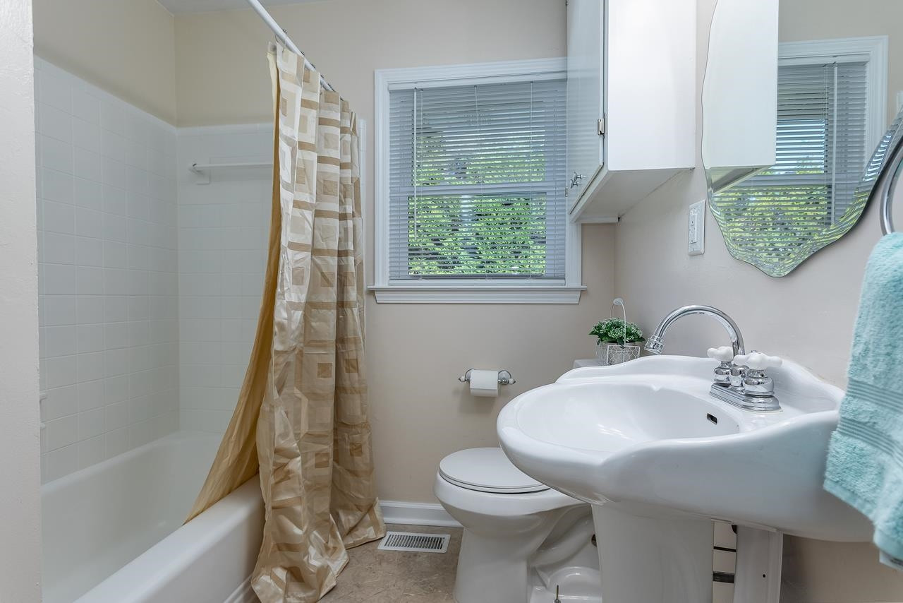 5104 Newcastle Road Raleigh, NC 27606 - Photo 19 of 26 Hall Bathroom