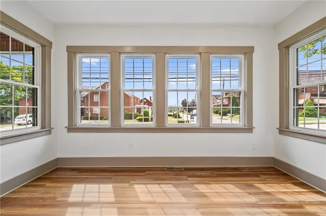 a view of a room with windows