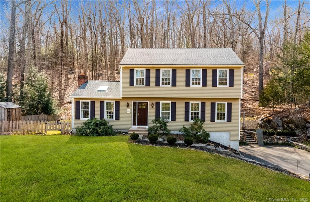 "Welcome Home." Spacious, Private tree lined back yard."