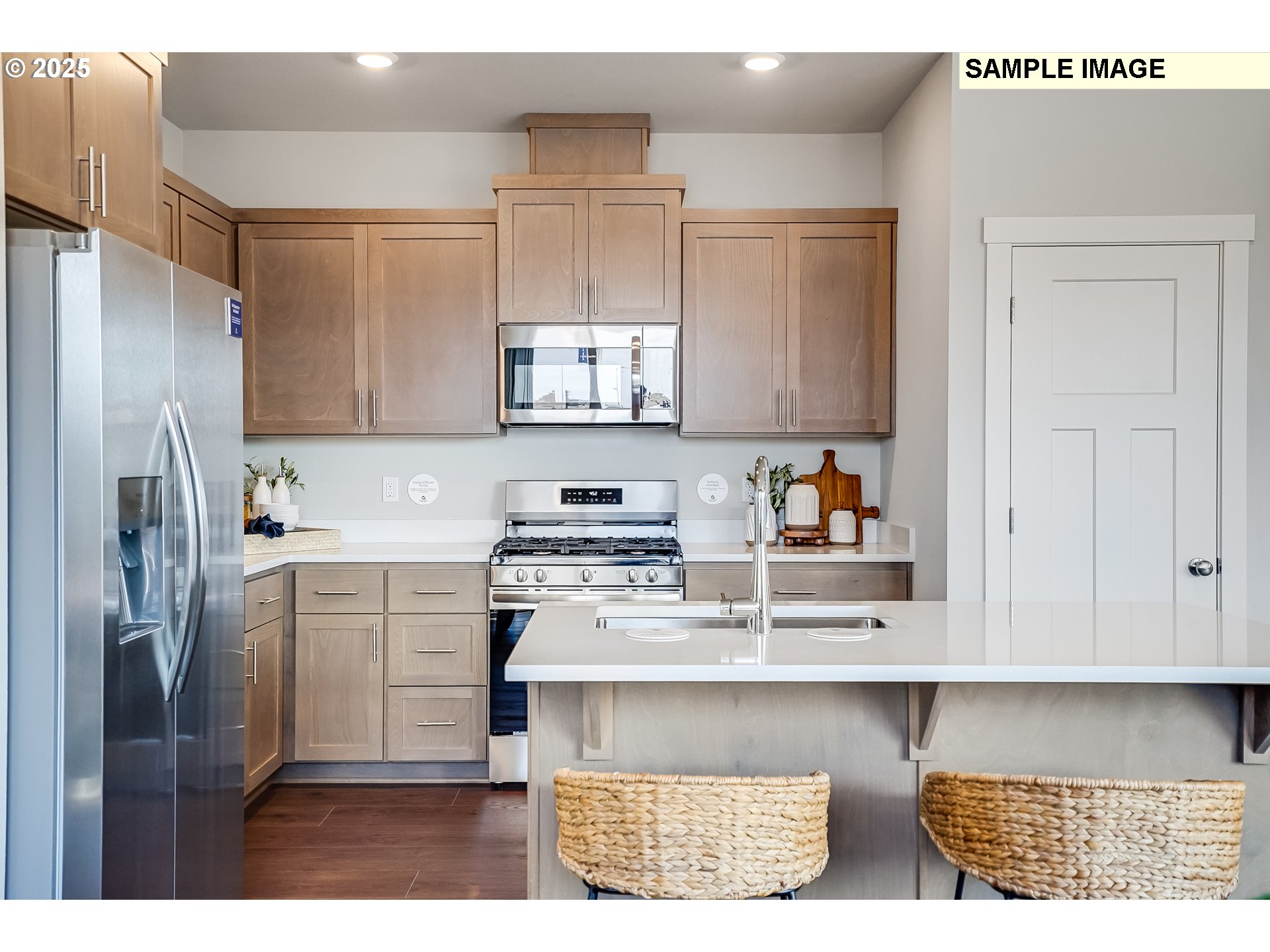 16656 Southwest Darling Lane, Unit HS21 Tigard, OR 97224 - Photo 11 of 31 a kitchen with stainless steel appliances granite countertop a refrigerator sink and stove