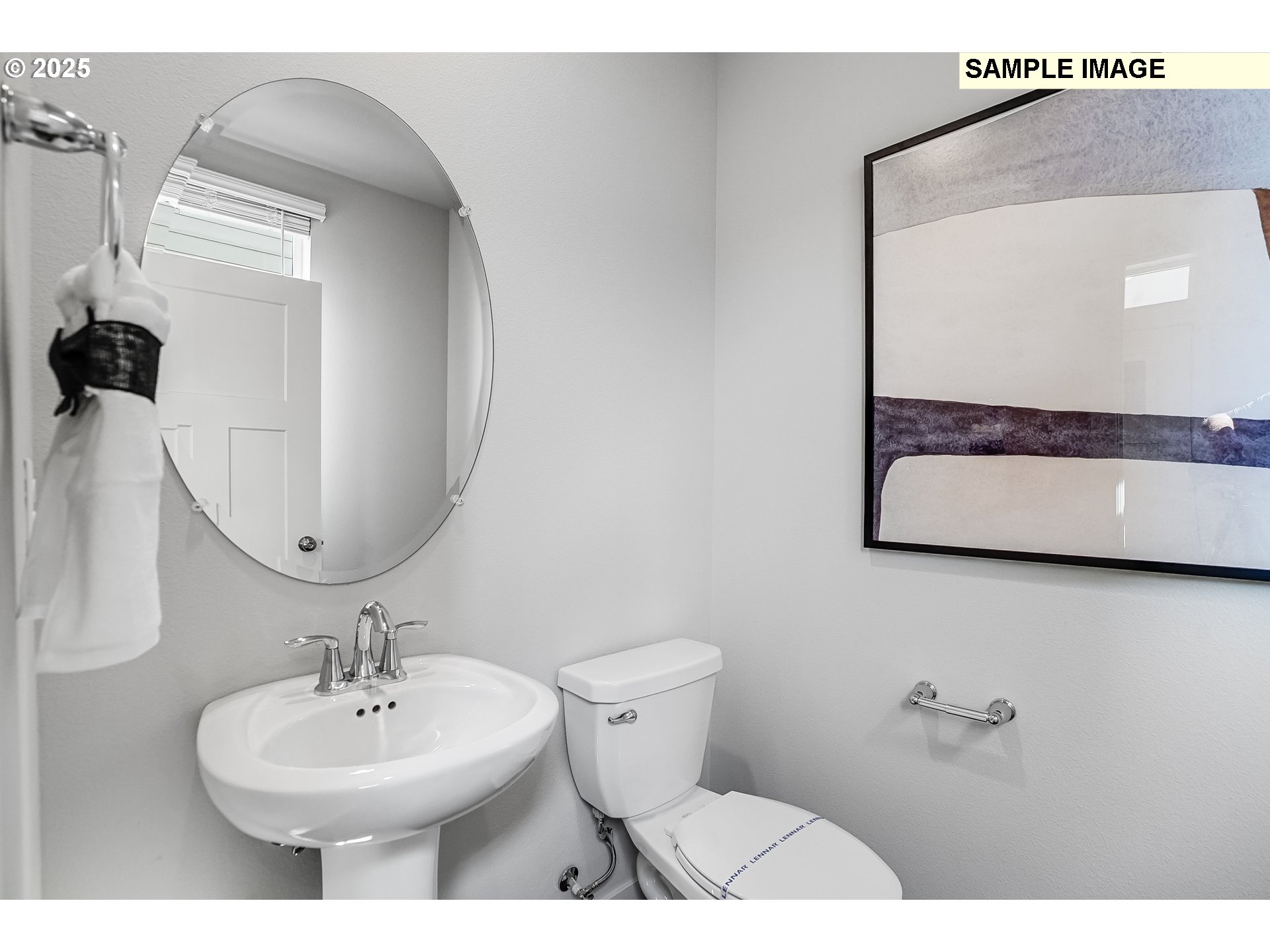 16656 Southwest Darling Lane, Unit HS21 Tigard, OR 97224 - Photo 12 of 31 a bathroom with a toilet sink and mirror