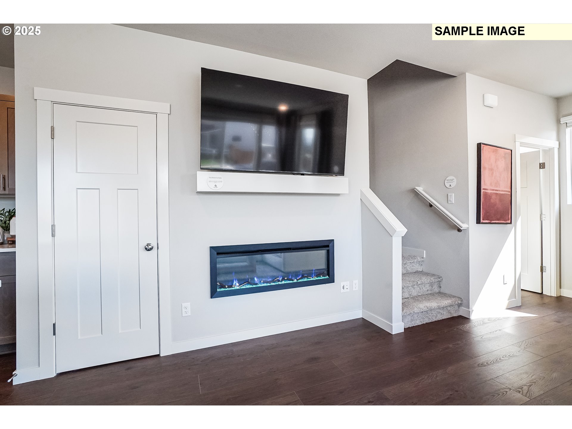 16656 Southwest Darling Lane, Unit HS21 Tigard, OR 97224 - Photo 13 of 31 a living room with a fireplace and a flat screen tv