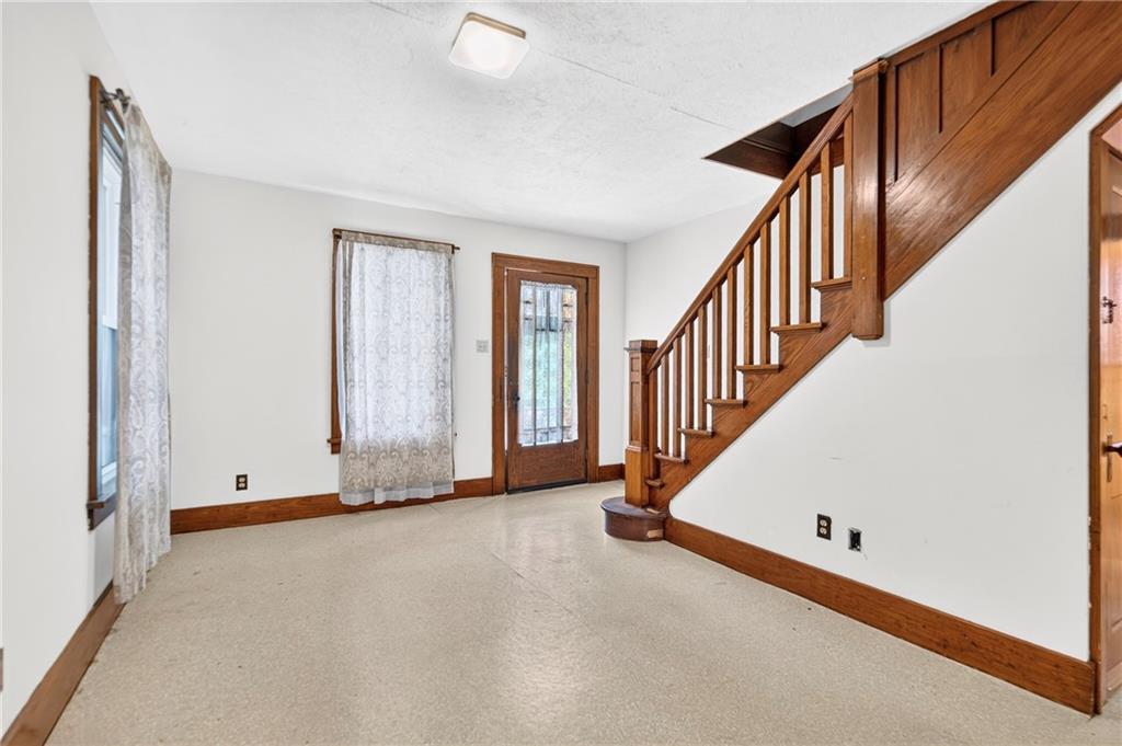 308 Ridge Road Brownsville, PA 15417 - Photo 9 of 49 Hardwood floors or wall to wall carpeting would help to make it feel cozier in the colder months.