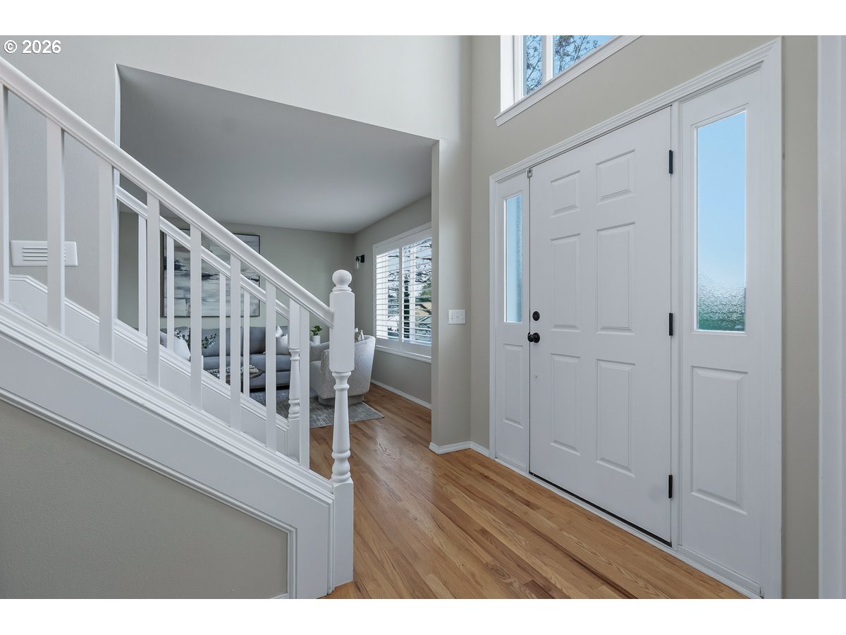 8361 Southwest 168th Avenue Beaverton, OR 97007 - Photo 3 of 31 a view of an entryway with wooden floor