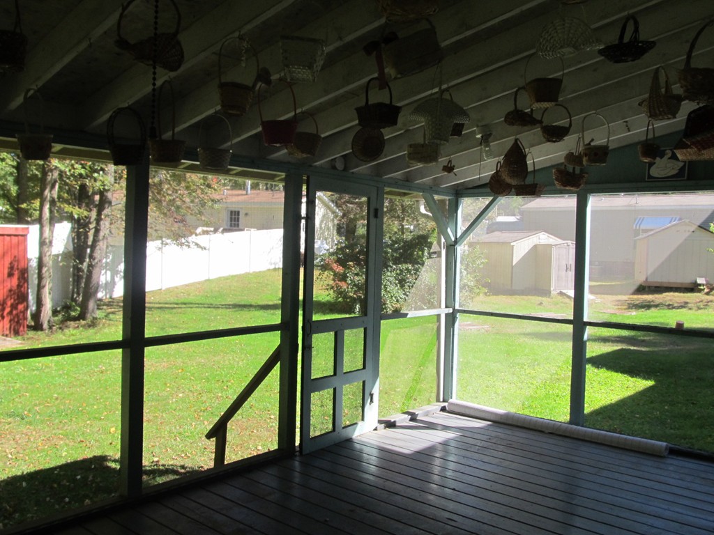 52 Gauthier Road Barre, MA 01005 - Photo 4 of 8 a view of an empty room with wooden floor and windows