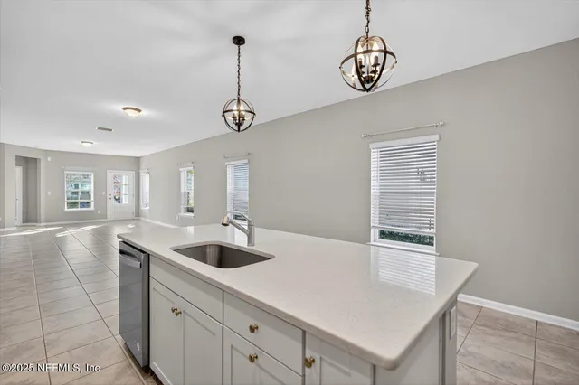 a bathroom with a double vanity sink and mirror