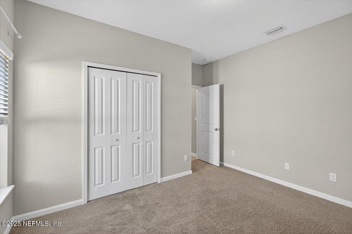 312 Clarys Run St. Augustine, FL 32092 - Photo 24 of 99 a view of an empty room