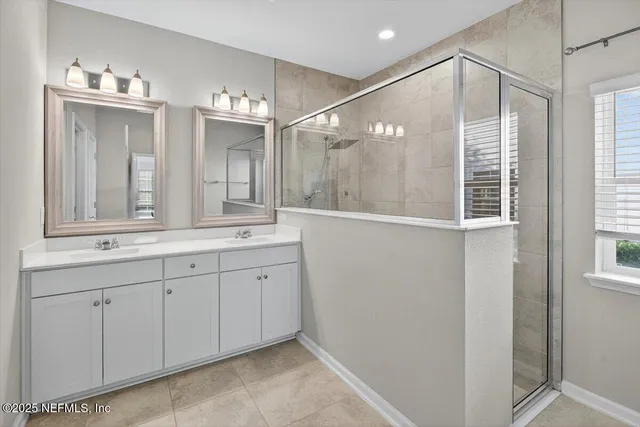 a view of swimming pool with a table and chairs