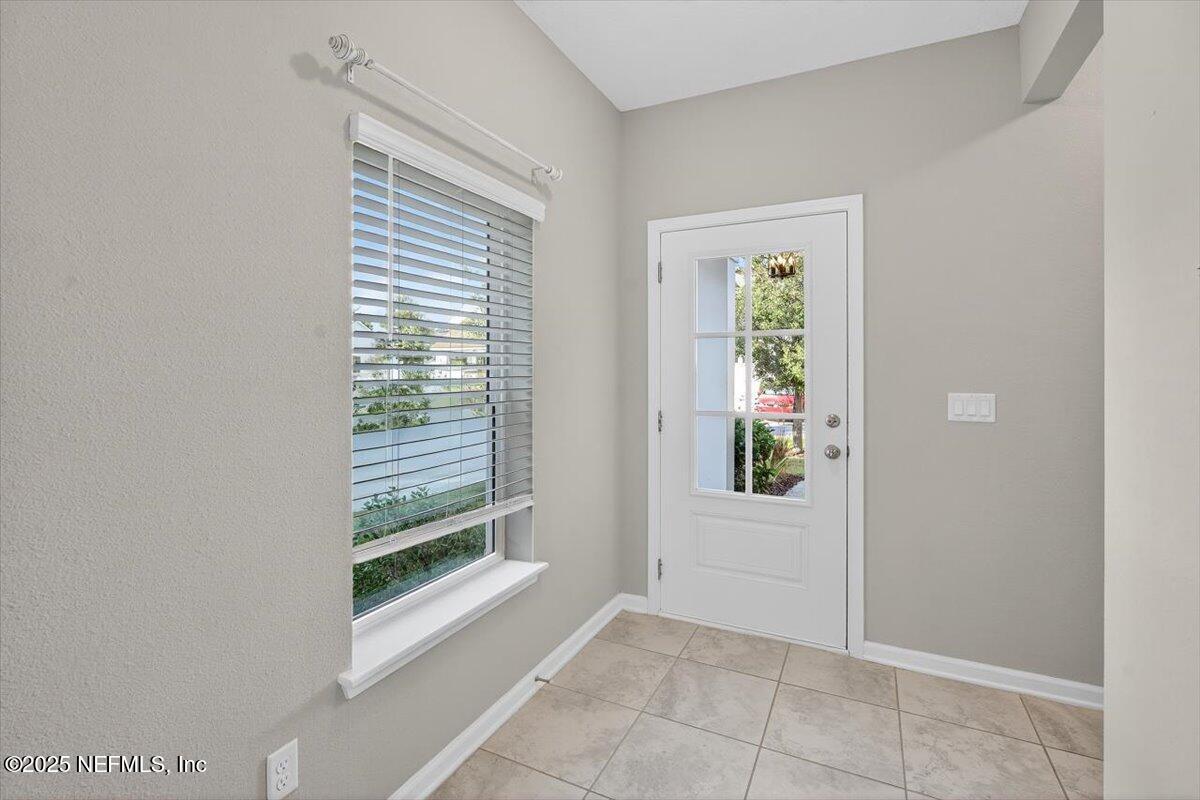 312 Clarys Run St. Augustine, FL 32092 - Photo 36 of 99 a view of an empty room with a window