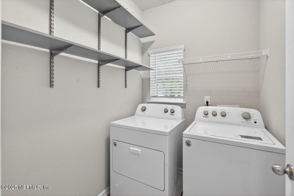 312 Clarys Run St. Augustine, FL 32092 - Photo 37 of 99 a view of bathroom with a washer and dryer