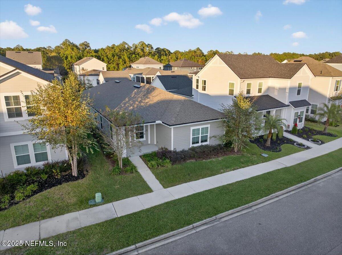 312 Clarys Run St. Augustine, FL 32092 - Photo 46 of 99 a front view of a house with a yard