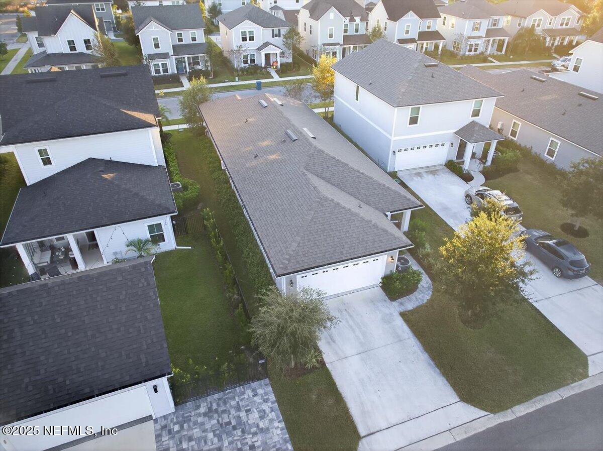 312 Clarys Run St. Augustine, FL 32092 - Photo 49 of 99 an aerial view of a house with yard
