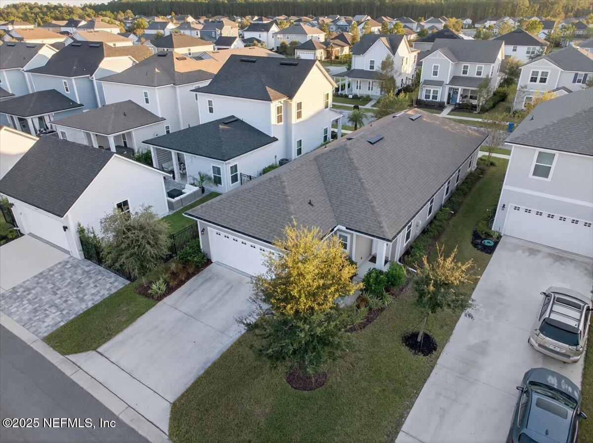 312 Clarys Run St. Augustine, FL 32092 - Photo 51 of 99 an aerial view of a house with a yard