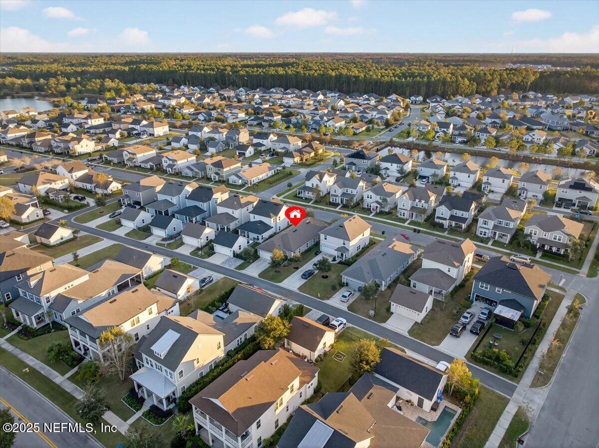 312 Clarys Run St. Augustine, FL 32092 - Photo 52 of 99 an aerial view of residential building with parking