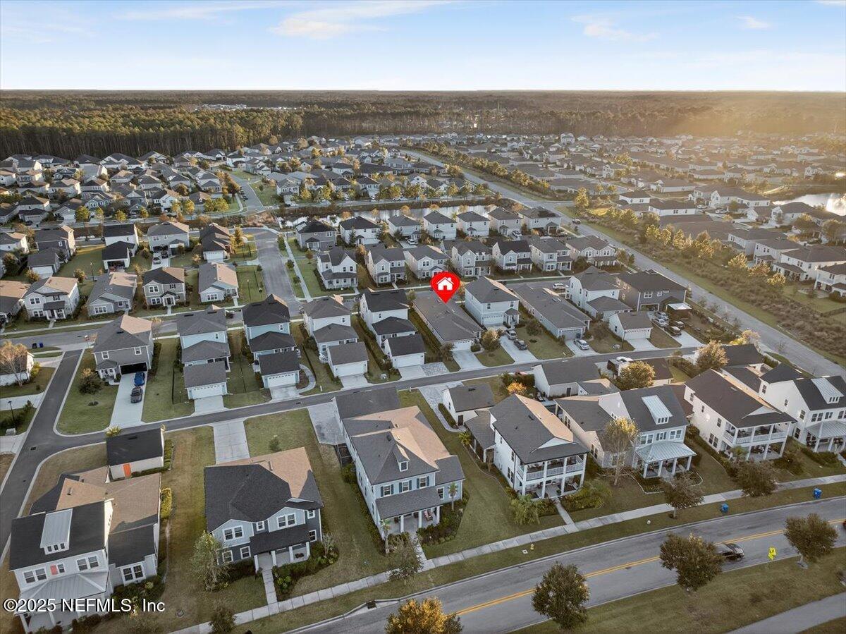 312 Clarys Run St. Augustine, FL 32092 - Photo 55 of 99 an aerial view of residential building with parking space