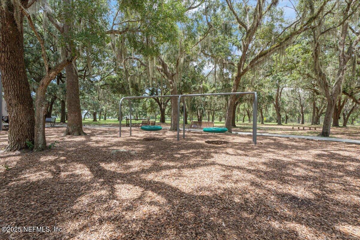 312 Clarys Run St. Augustine, FL 32092 - Photo 79 of 99 a view of outdoor space with a garden