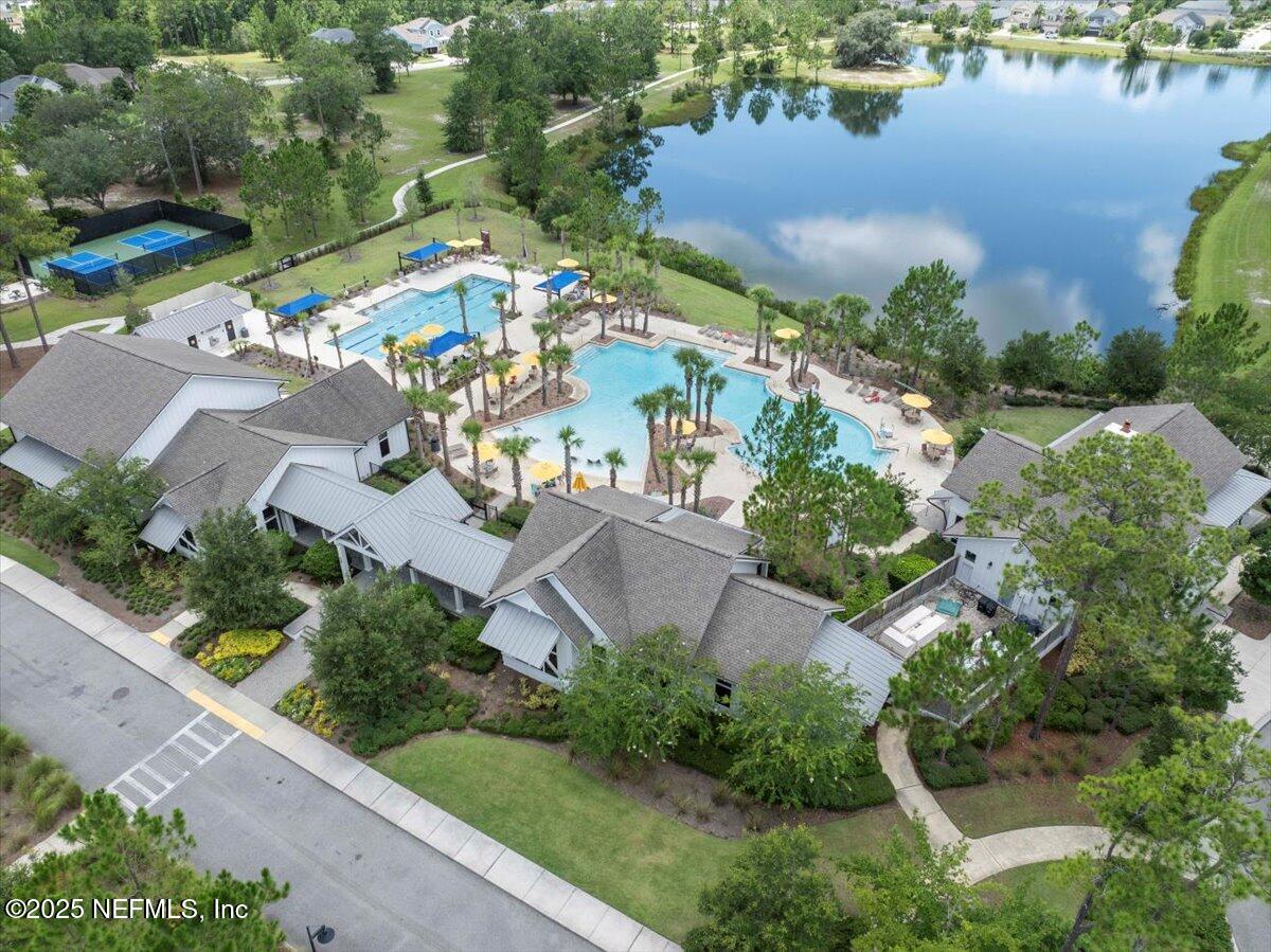 312 Clarys Run St. Augustine, FL 32092 - Photo 89 of 99 an aerial view of residential houses with outdoor space and lake view