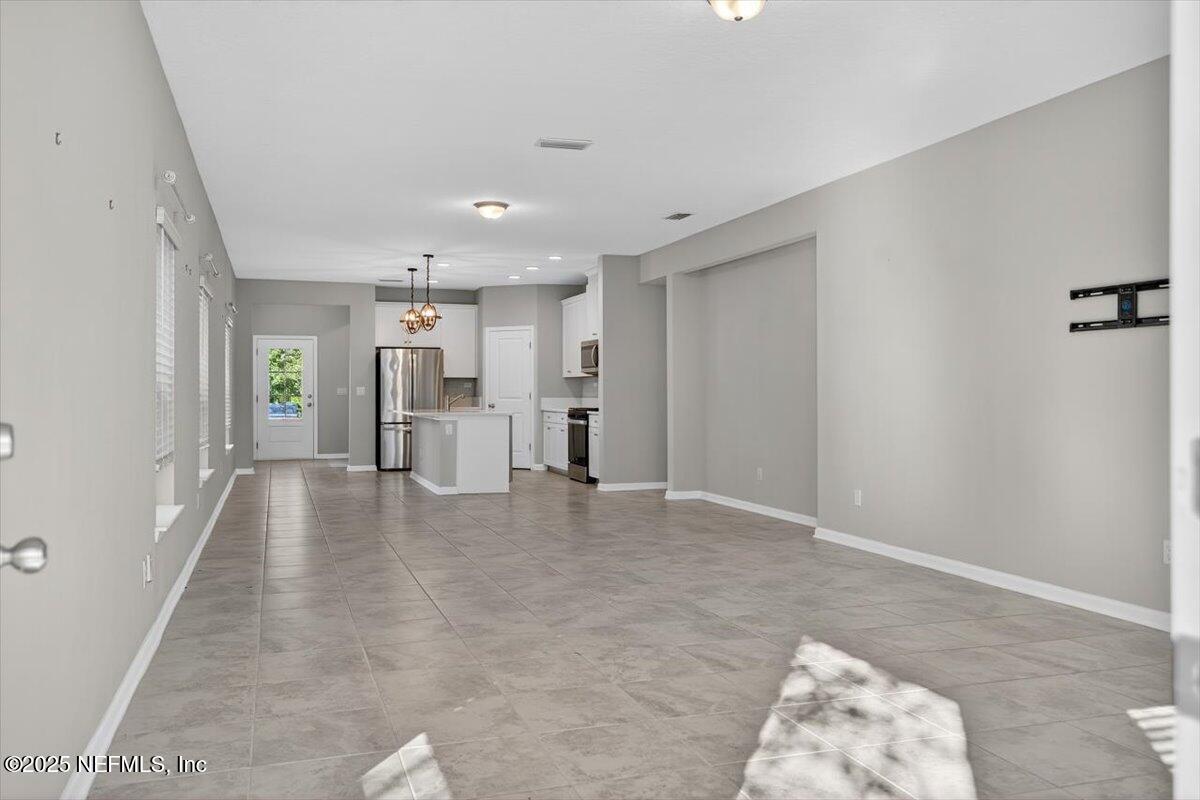 312 Clarys Run St. Augustine, FL 32092 - Photo 8 of 99 a view of a livingroom with furniture and an entryway