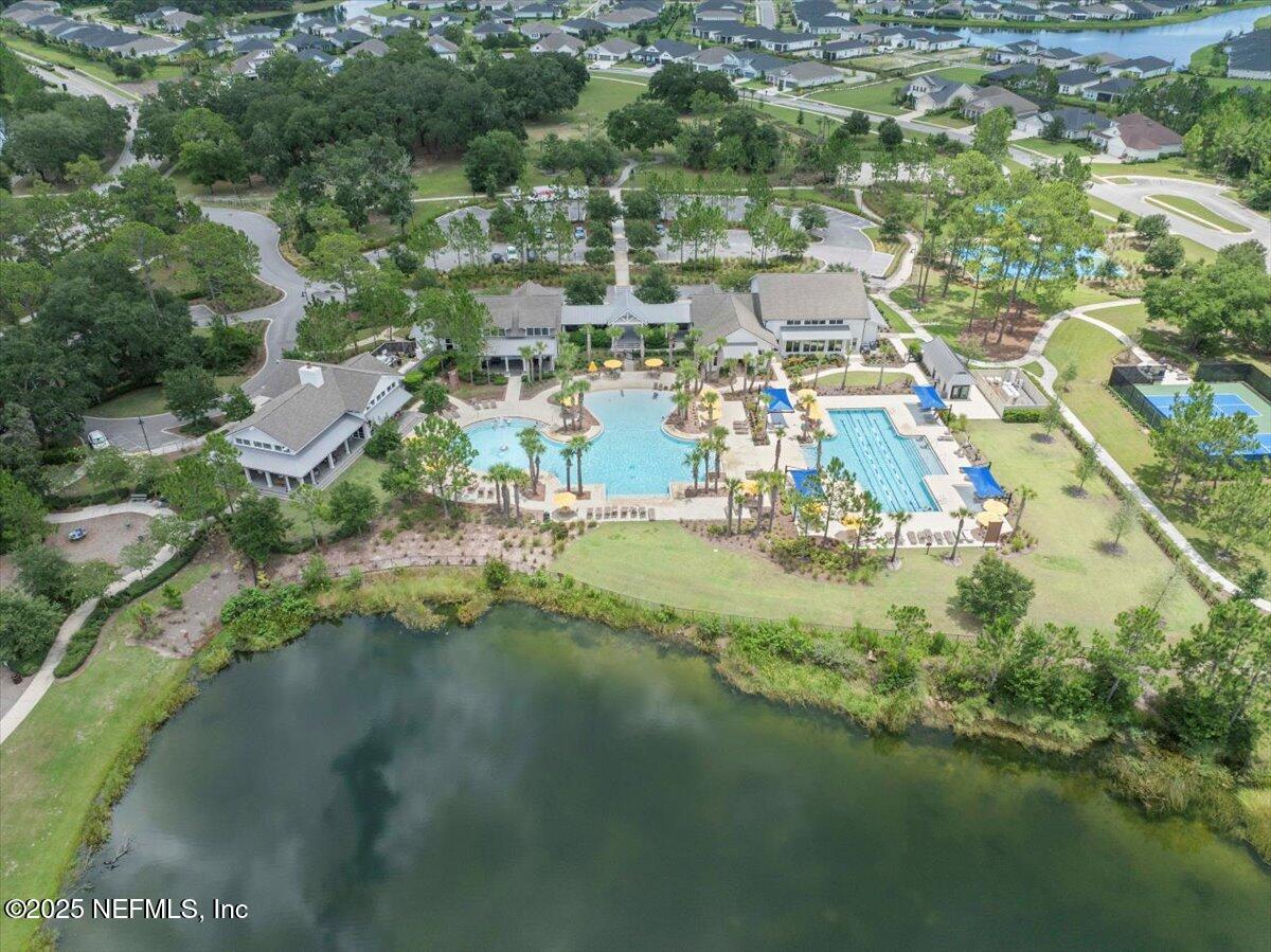 312 Clarys Run St. Augustine, FL 32092 - Photo 91 of 99 an aerial view of residential houses with outdoor space and lake view