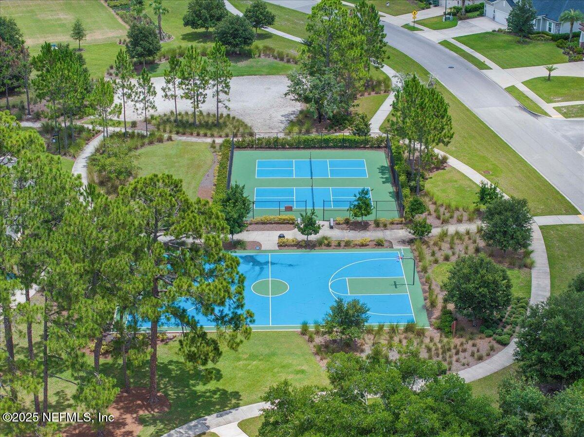 312 Clarys Run St. Augustine, FL 32092 - Photo 94 of 99 a aerial view of a house with a yard