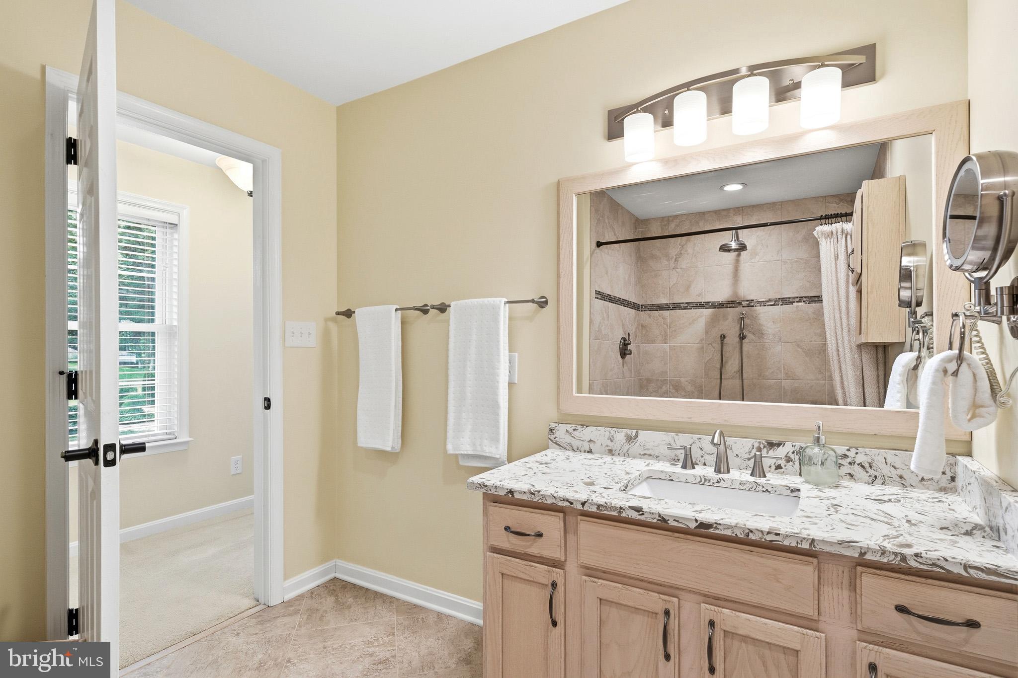 3148 Holland Cliffs Road Huntingtown, MD 20639 - Photo 23 of 61 Elegant tile and modern finishes!