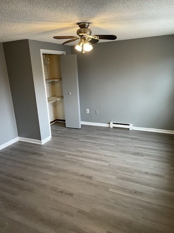 270 Sunderland Road, Unit 76 Worcester, MA 01604 - Photo 11 of 21 a view of a livingroom with wooden floor