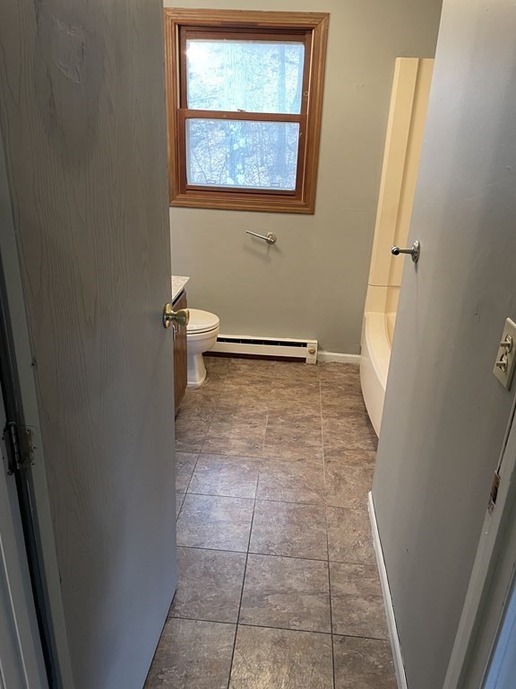 270 Sunderland Road, Unit 76 Worcester, MA 01604 - Photo 13 of 21 a view of an empty room with a window