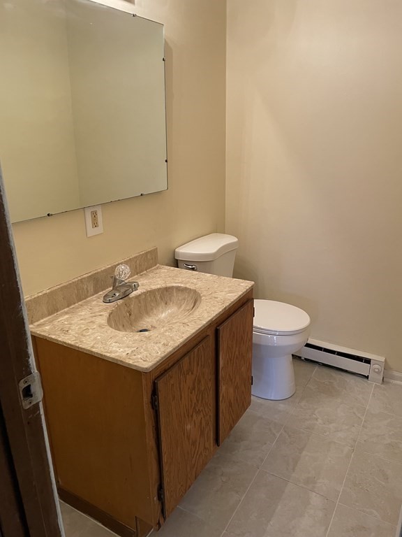 270 Sunderland Road, Unit 76 Worcester, MA 01604 - Photo 14 of 21 a bathroom with a sink and a toilet