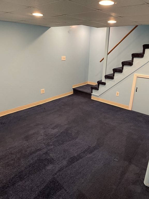 270 Sunderland Road, Unit 76 Worcester, MA 01604 - Photo 17 of 21 a view of an empty room with stairs