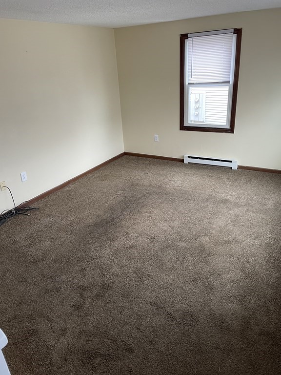 270 Sunderland Road, Unit 76 Worcester, MA 01604 - Photo 6 of 21 an empty room with windows