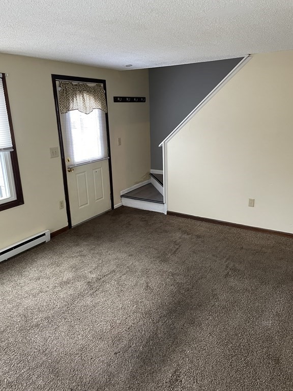 270 Sunderland Road, Unit 76 Worcester, MA 01604 - Photo 7 of 21 an empty room with mirror